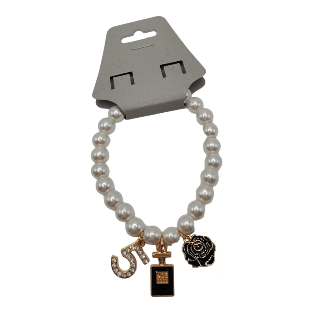 Pearl and gold Camellia charm bracelet